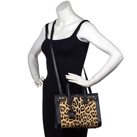 ysl printed calf hair clutch|Saint Laurent Bea YSL Leopard.